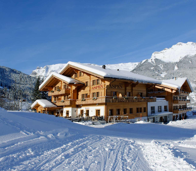Aspen Alpine Lifestyle Hotel wit snow outside in winter