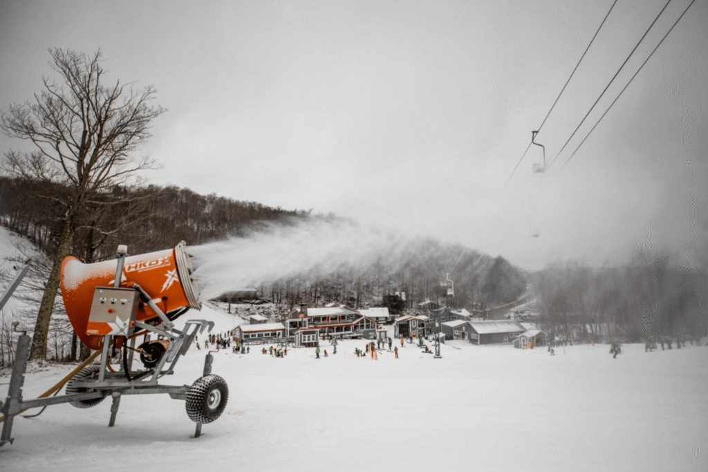 a snow making gun firing snow at Mad River Glen